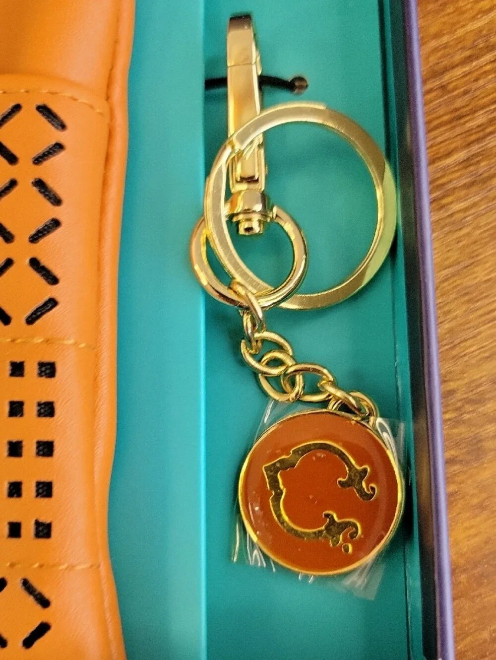 NWT C. Wonder Perforated Wristlet and Bag Charm Set In Gift Box